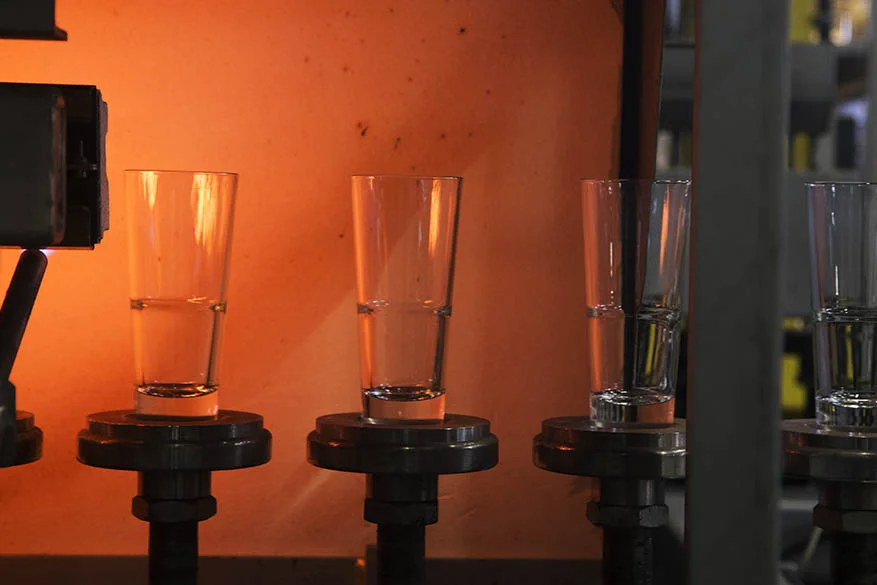 Glasses going through heat treatment process: Registered Xtratuff®